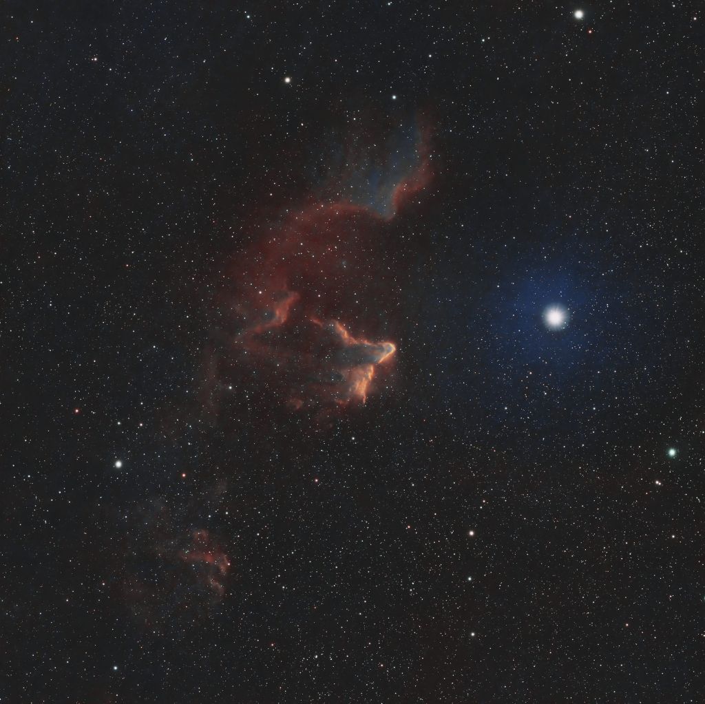 Astrophotography of the Ghost Nebula, capturing its eerie shapes and faint glow in deep space